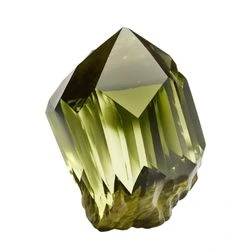 a crystal colored in olive green on a white background