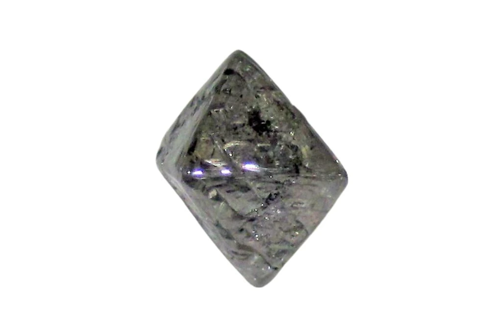 trigon diamond crystal on a white background