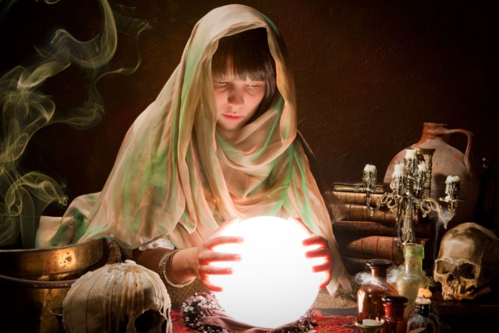 A woman is scrying a crystal ball