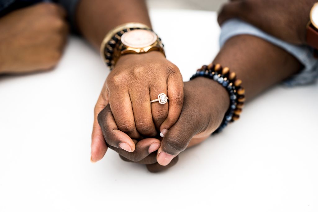 A couple holding hands