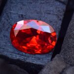 A ruby on a burned wood