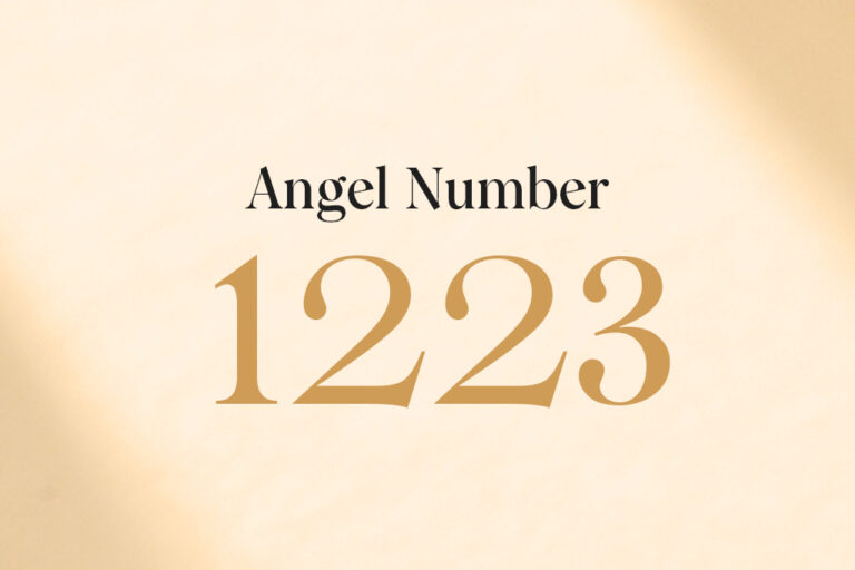 angel number 1223 written on a beige background