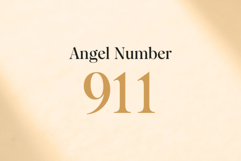 angel number 911 written on a beige background