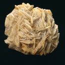 A barite crystal on a black background