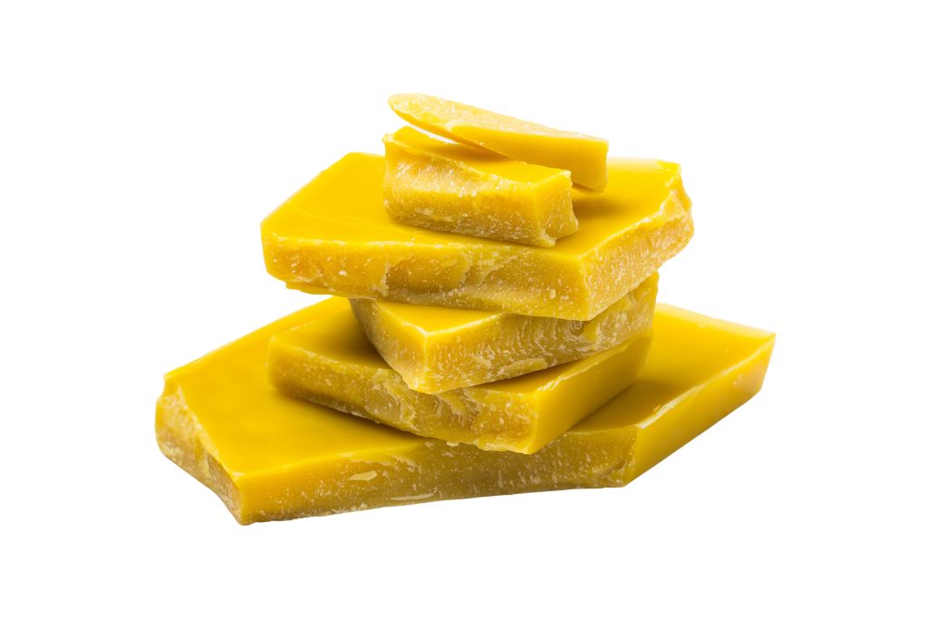 A stack of beeswax on a white background