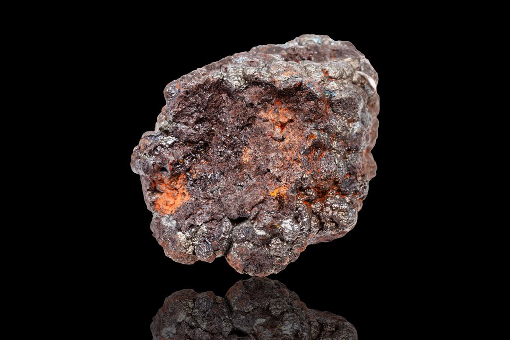 Goethite on a black reflective background