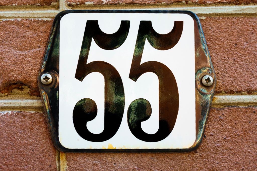 A house number that a number 55 is written on it