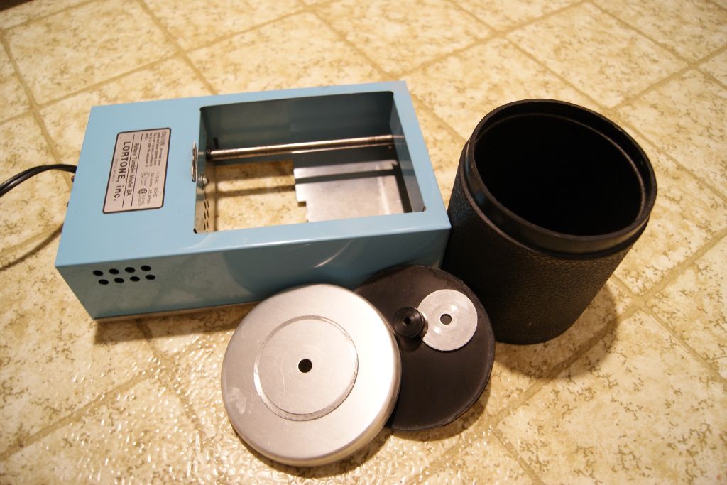 A tumbler machine on the floor