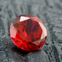 A polished ruby on the floor