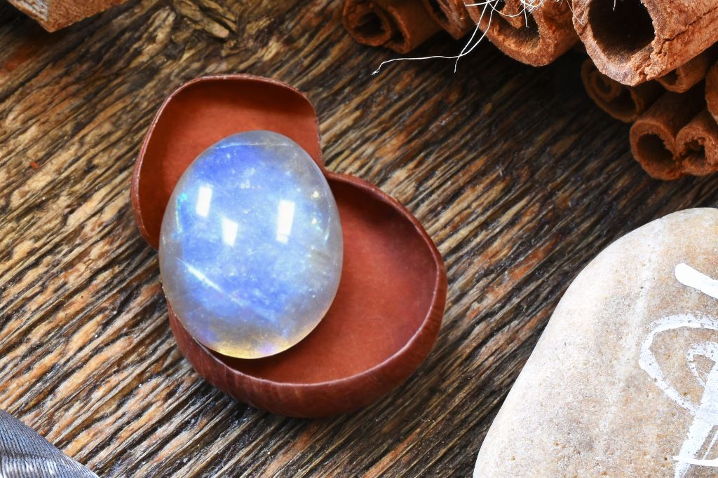 Silver Moonstone on an old wooden table