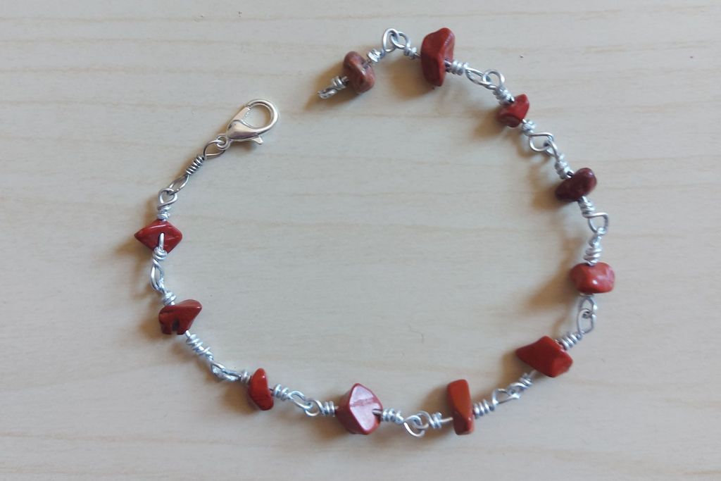 a gemstone bead bracelet placed on the table