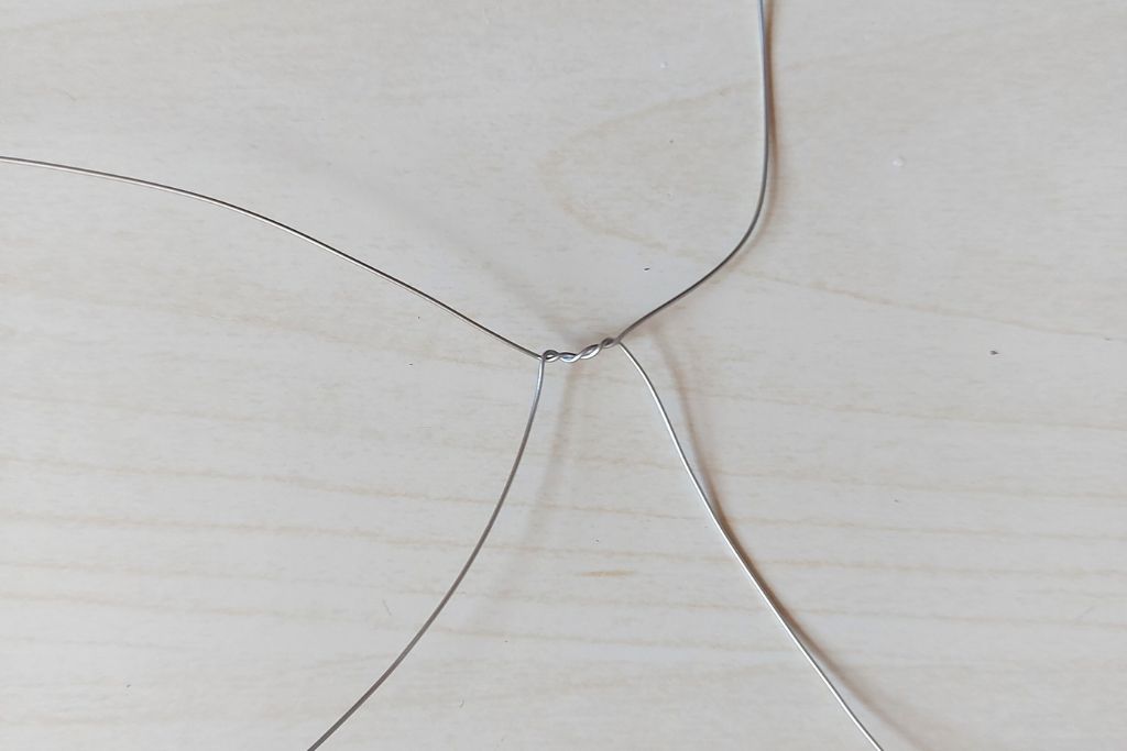 a prepared wire twisted placed on a table