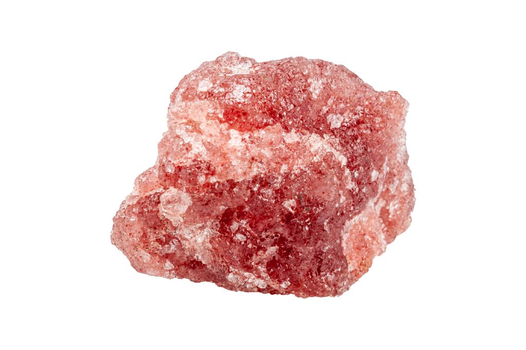 A strawberry quartz on a white background