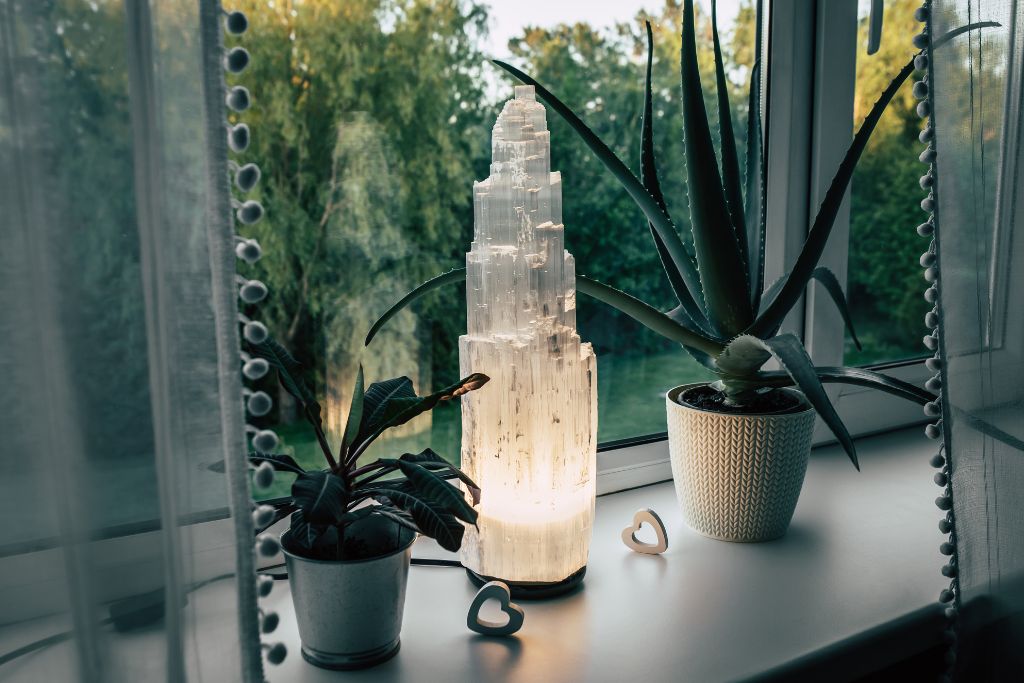 Clear Quartz by the window for sunlight cleansing.