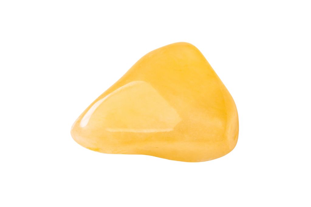 Yellow Aventurine crystal on a white background