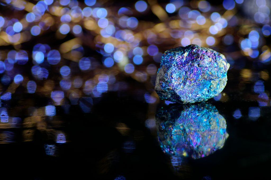 chalcopyrite on dark and shiny blue lights