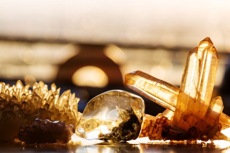 crystals representing the earth element placed on top of table with blurry background