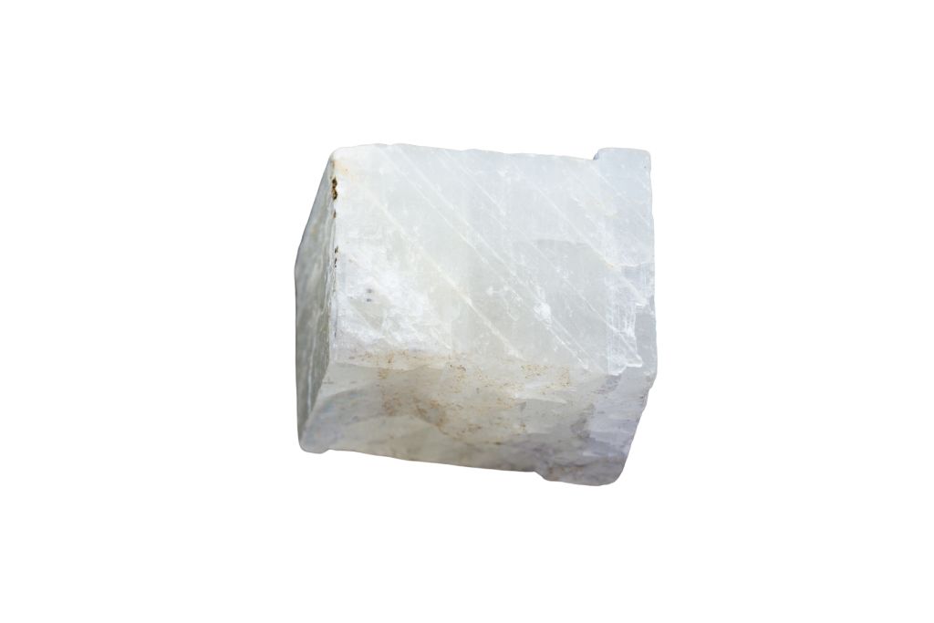 white calcite cube on white background