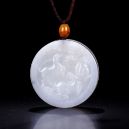 white jade necklace on dark background