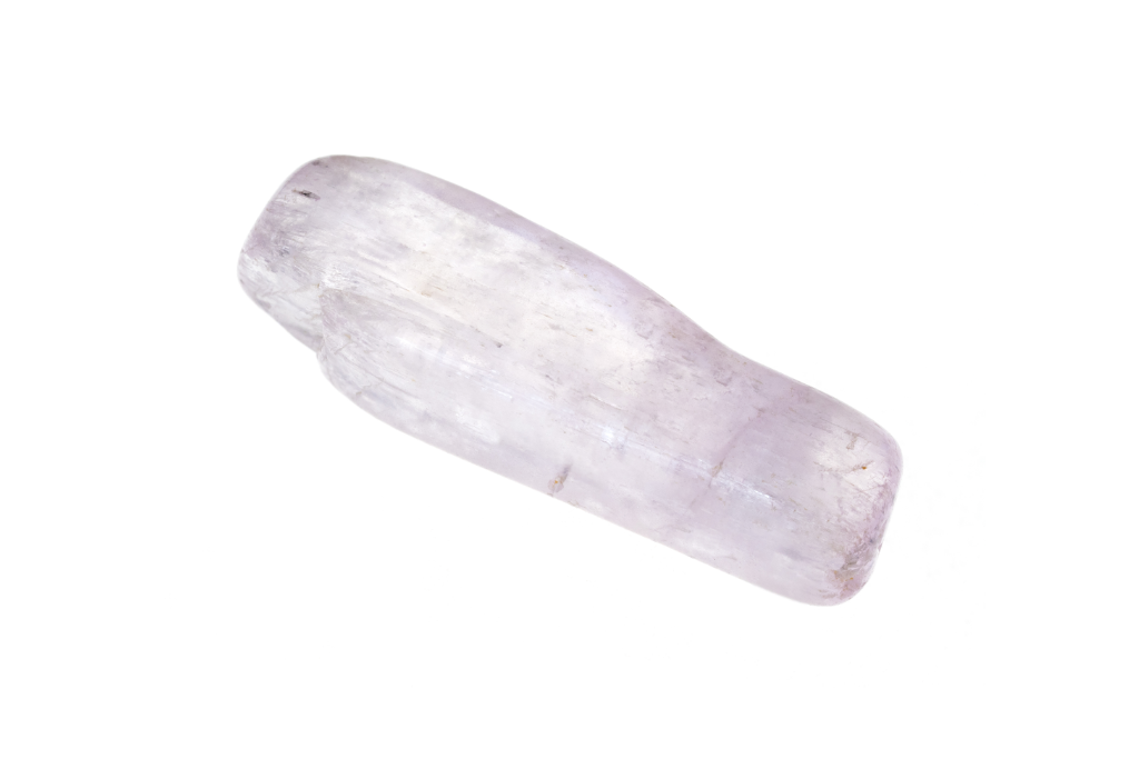 white kunzite with pinkish hue on white background