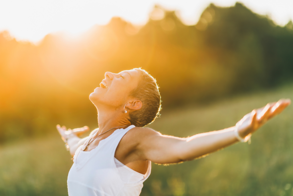 woman meditating outdoors