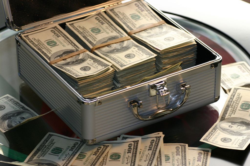 A briefcase that is full of money