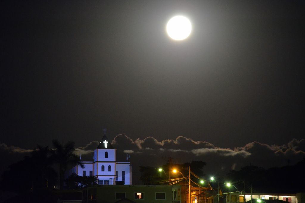 A full moon over a town