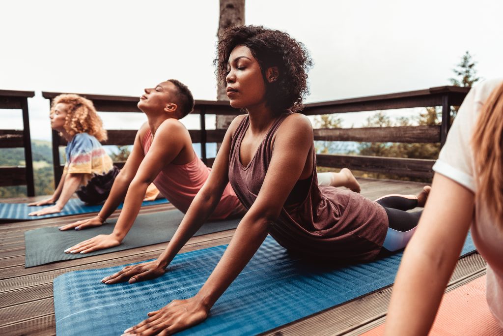 A group of persons doing yoga