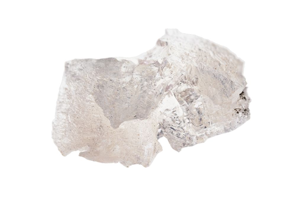 A raw Danburite crystal on a white background