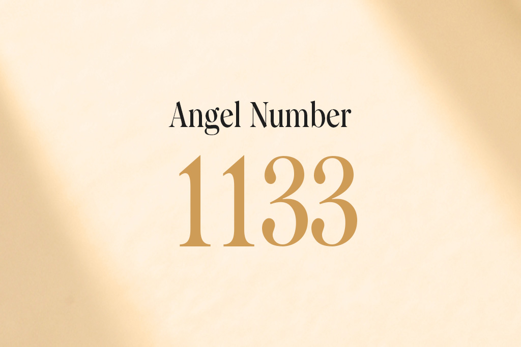 angel number 1133 written on a beige background