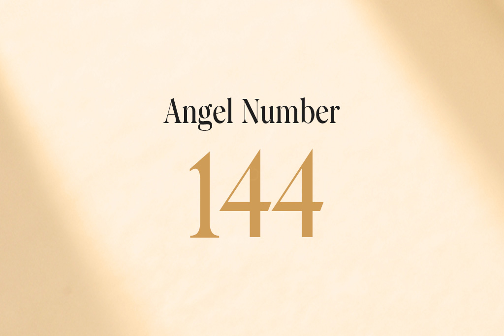 angel number 144 written on a beige background