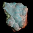 A Blue Aragonite crystal on a black background