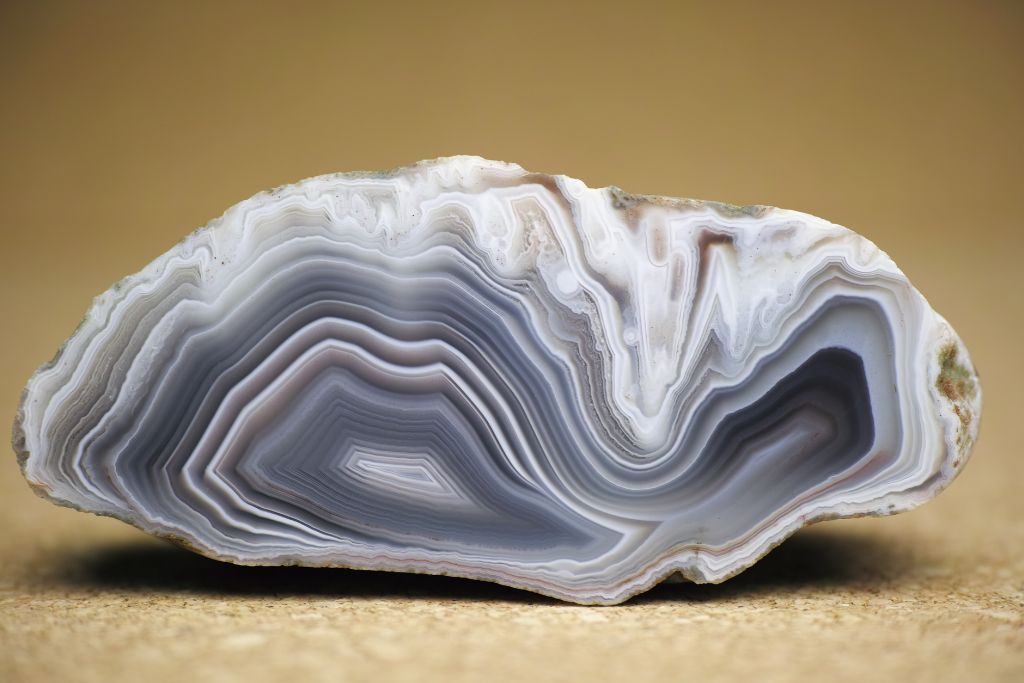 A Botswana agate on a brownish background. Source: Wikimedia | 峠 武宏