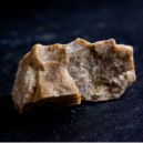 A raw Hemimorphite crystal on a dark background