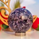 A Indigo Gabbro Sphere on a pedestal. Source: Etsy | GodCrystalGifts