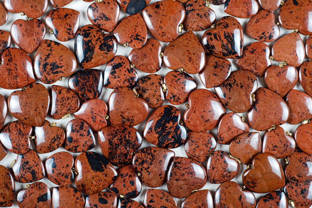 Mahogany Obsidian Pendants on a white background