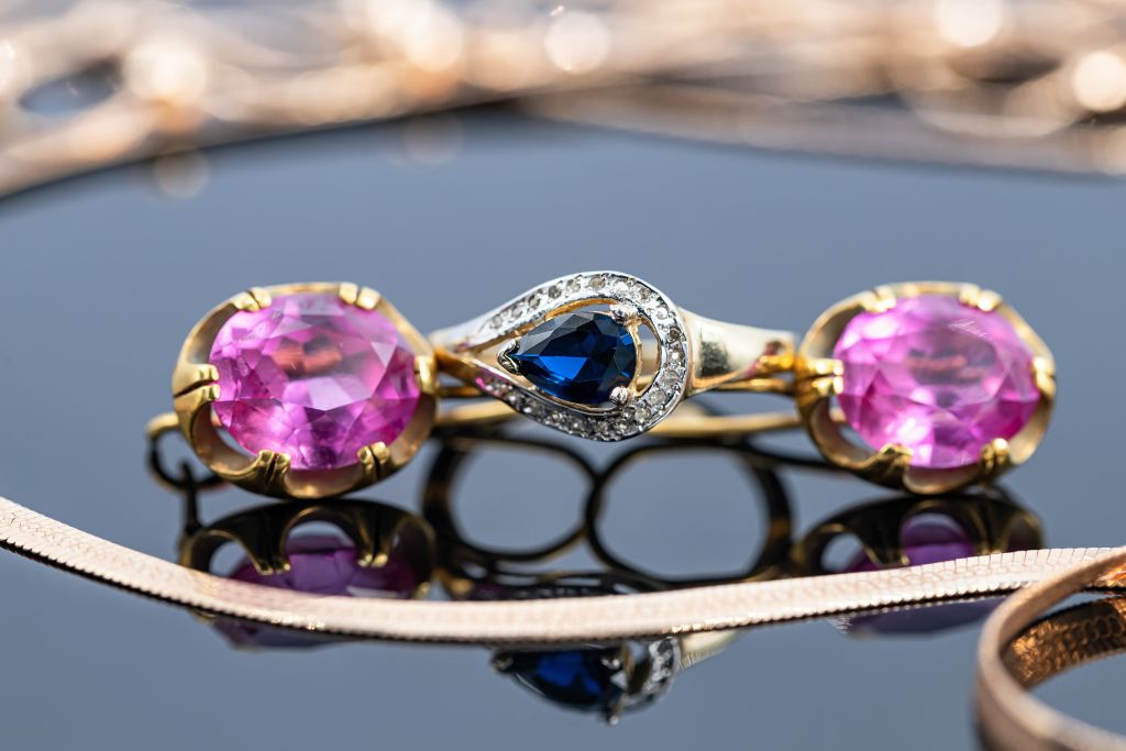 A ruby and Sapphire jewelry on a table