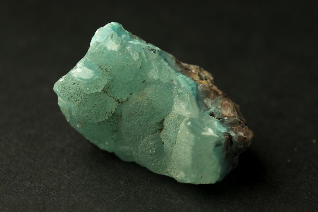 A Smithsonite crystal on a dark background