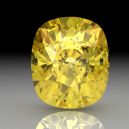 A yellow sapphire on a dark background