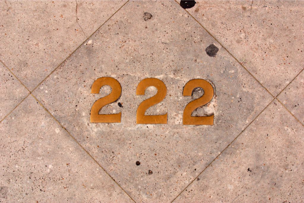 angel number 222 engraved on flooring
