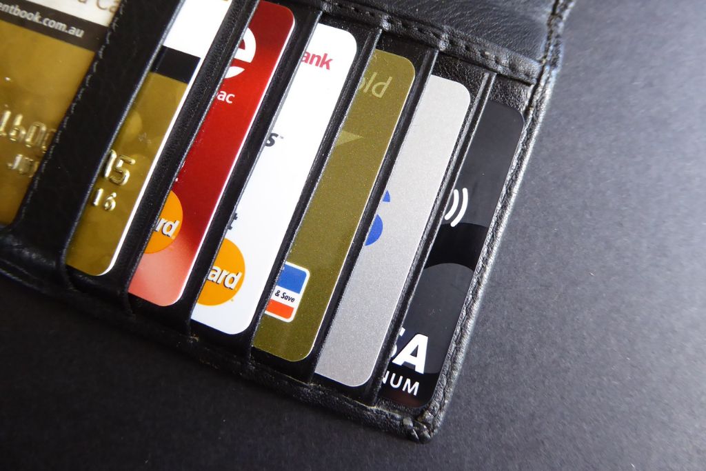 A stack of cards on a wallet card holder