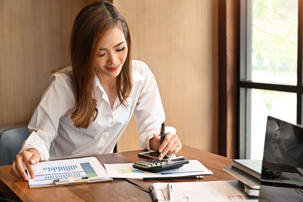 woman calculating her finances