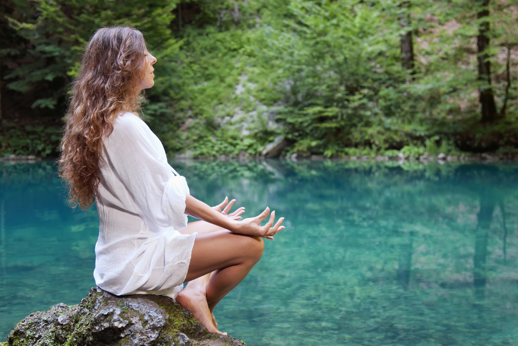 woman meditating in nature