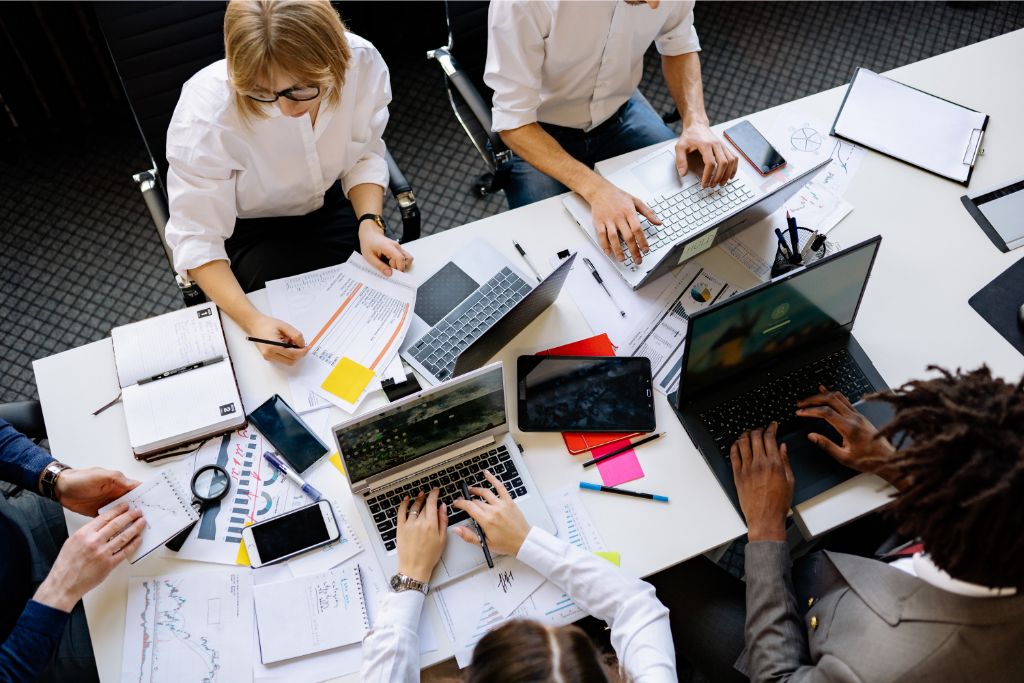 people seriously working on their office desk