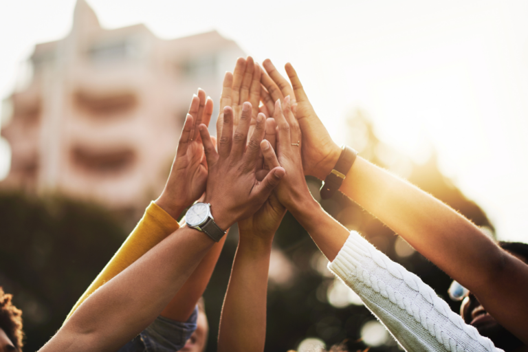 People Raising Hands