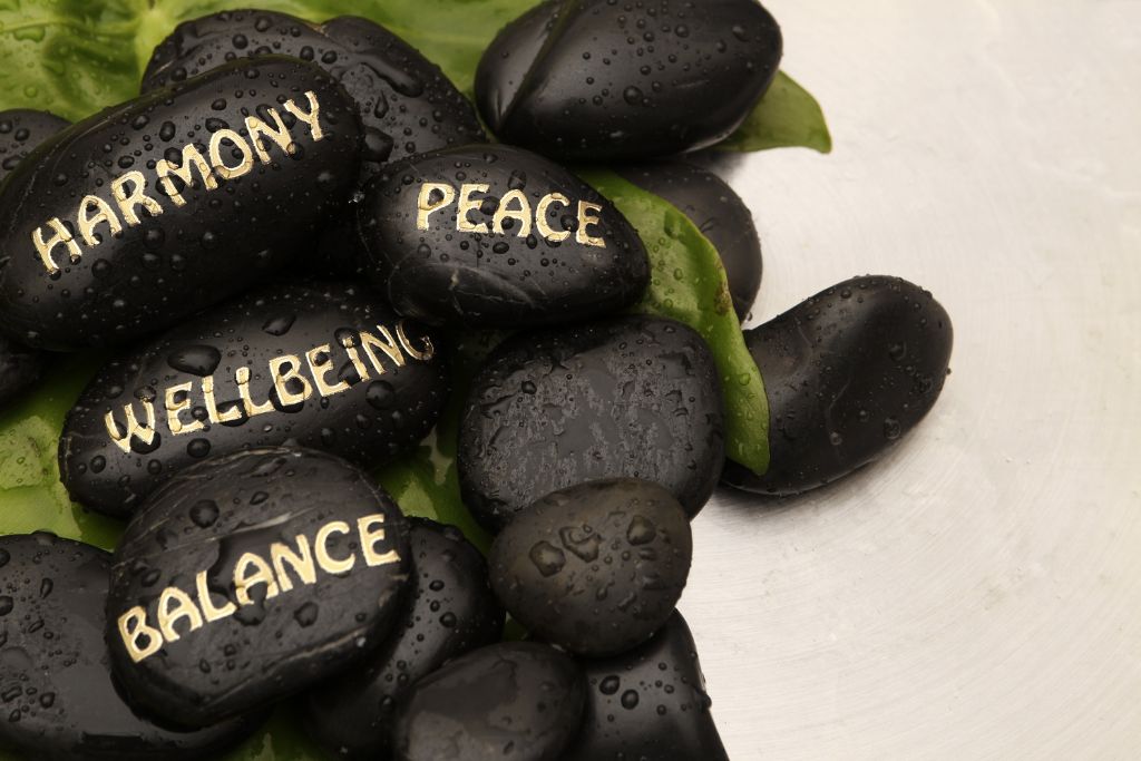 Words of Affirmation written on black rocks