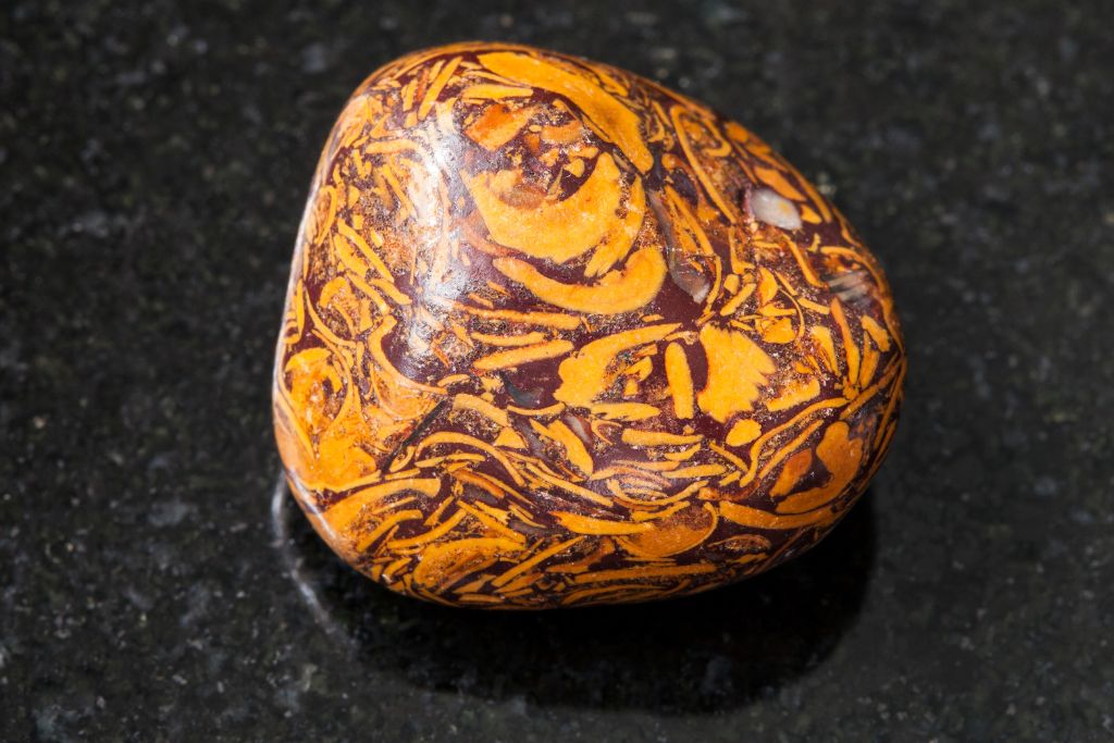 A Calligraphy Jasper on a black granite