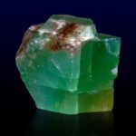A Green Calcite on a dark background
