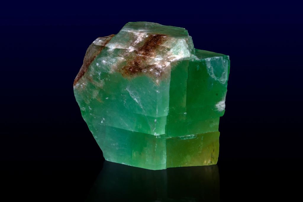 A Green Calcite on a dark background