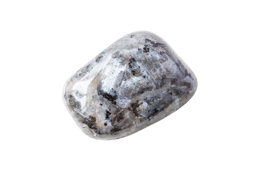 Larvikite rock on a white background